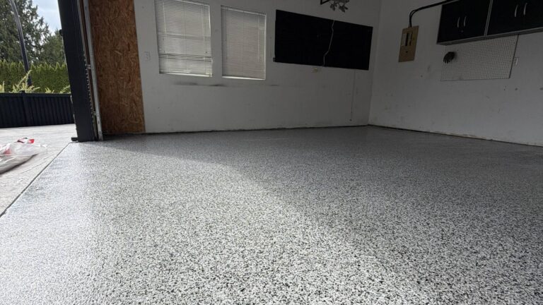 Finished decorative flake epoxy garage floor in Coquitlam, full bay coated