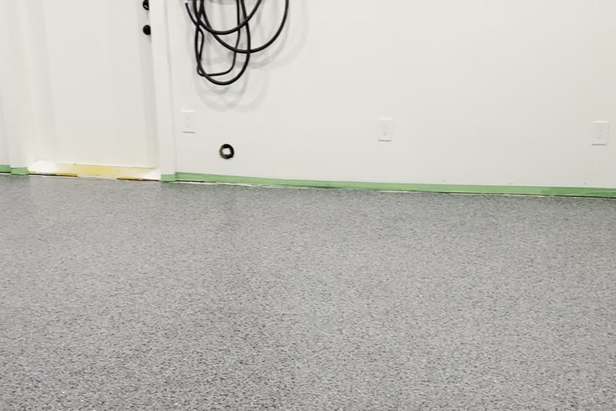Finished glossy decorative flake epoxy garage floor after coating
